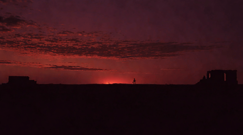 Mujer en medio de un desierto tormentoso bajo una luna roja